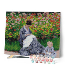 Cargar imagen en el visor de la galería, Camille Monet y un niño en el jardín del artista en Argenteuil - Monet