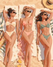 Cargar imagen en el visor de la galería, Pintar por numeros Figured'Art - Trío en una playa bañada por el sol