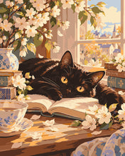 Cargar imagen en el visor de la galería, Pintar por numeros Figured'Art - Gato negro en un rincón de flores primaverales