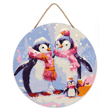 Cargar imagen en el visor de la galería, Pintar por Números en Disco de Madera - Familia de Pingüinos en la Nieve