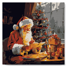Cargar imagen en el visor de la galería, Mini Pintura por Números 20x20cm con bastidor - Papá Noel leyendo
