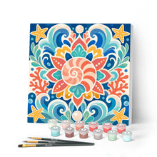 Cargar imagen en el visor de la galería, Pintar por numeros Figured'Art - Mini Pintura por Números 20x20cm con bastidor - Mandala de conchas marinas